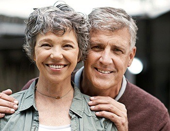 Senior man and woman smiling together