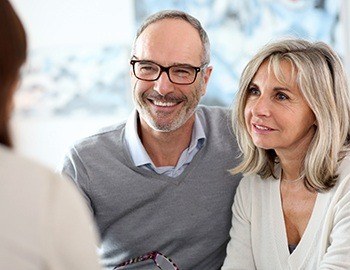 Older man and woman at dental consultation