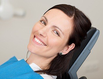 Smiling woman in dental chair