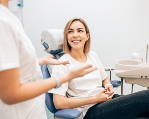 dentist talking to patient about teeth whitening in Milwaukee